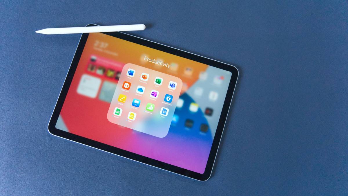 Best tablet board games displayed on a 10-inch gaming tablet during a cozy game night with friends